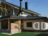 wooden cottage from glulam facade